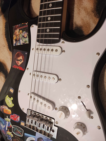 Half stickered guitar